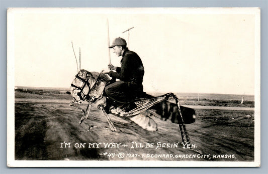 EXAGGERATED GRASSHOPER RIDING VINTAGE REAL PHOTO POSTCARD RPPC GARDEN CITY