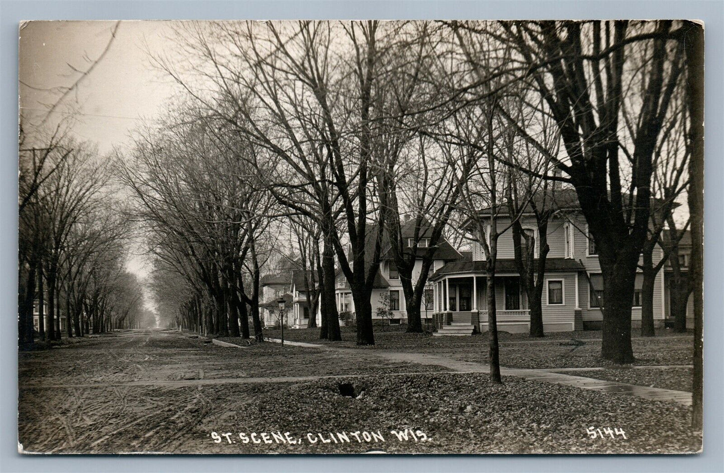 CLINTON WI STREET SCENE ANTIQUE REAL PHOTO POSTCARD RPPC w/ CORK CANCEL