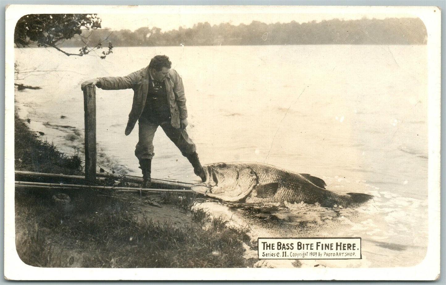 FISHING EXAGGERATED 1911 ANTIQUE REAL PHOTO POSTCARD RPPC w/ CORK STAMP