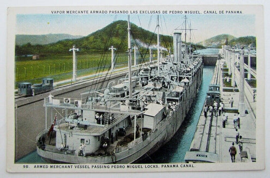 VINTAGE POSTCARD - ARMED MERCHANT VESSEL PASSING PEDRO MIGUEL LOCKS PANAMA CANAL
