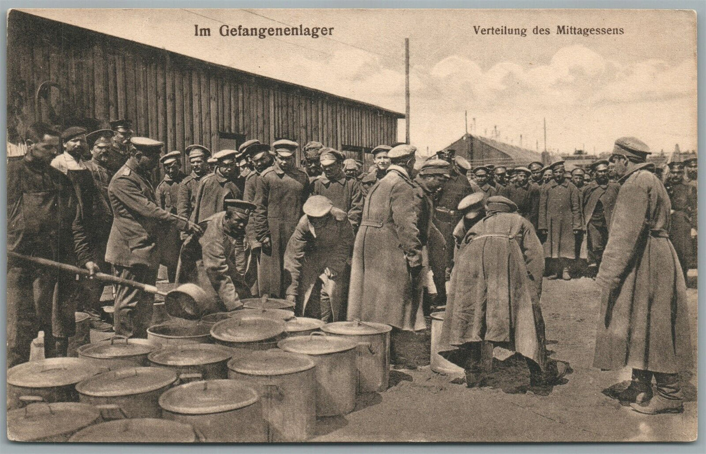 RUSSIAN PRISONERS in GERMAN CAMP WWI ERA ANTIQUE POSTCARD