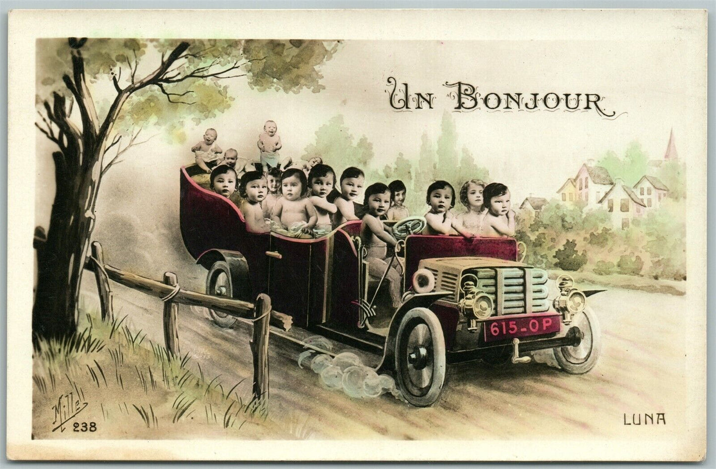 MULTIPLE BABIES DRIVING CAR HAND COLORED REAL PHOTO ANTIQUE POSTCARD RPPC