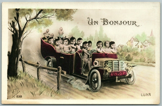 MULTIPLE BABIES DRIVING CAR HAND COLORED REAL PHOTO ANTIQUE POSTCARD RPPC
