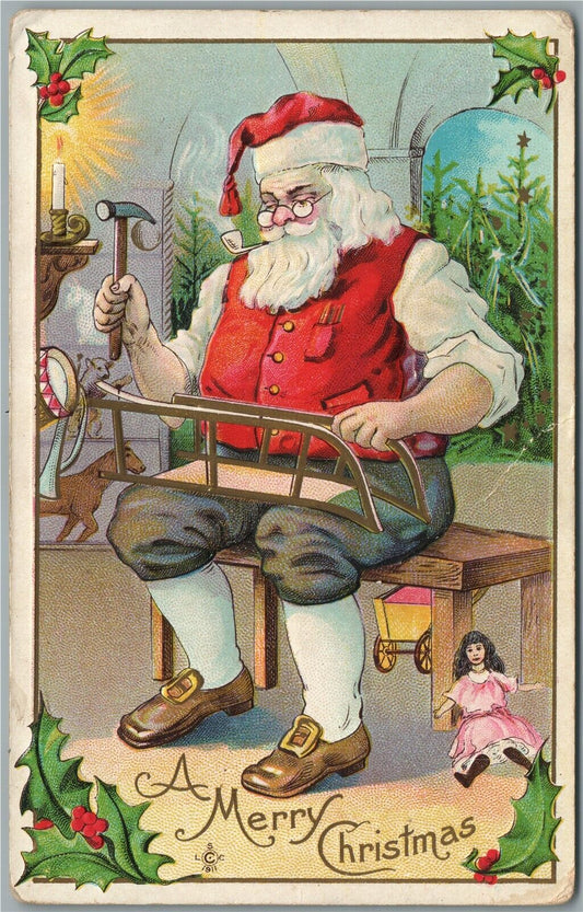 SANTA WORKING CHRISTMAS ANTIQUE POSTCARD