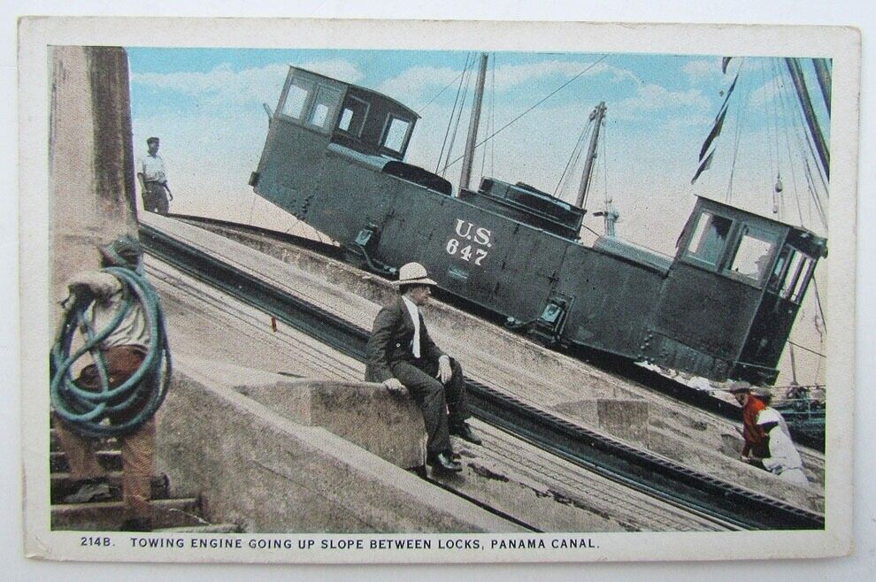 VINTAGE POSTCARD - TOWING ENGINE GOING UP SLOPE BETWEEN LOCKS PANAMA CANAL