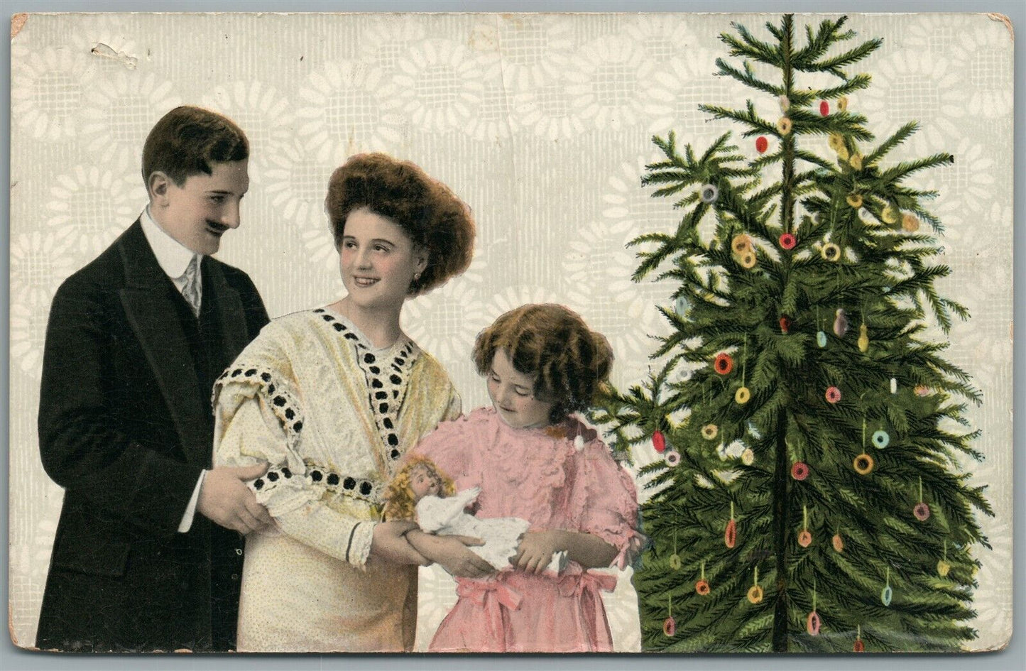 FAMILY w/ CHRISTMAS TREE & GIRL w/ DOLL ANTIQUE POSTCARD
