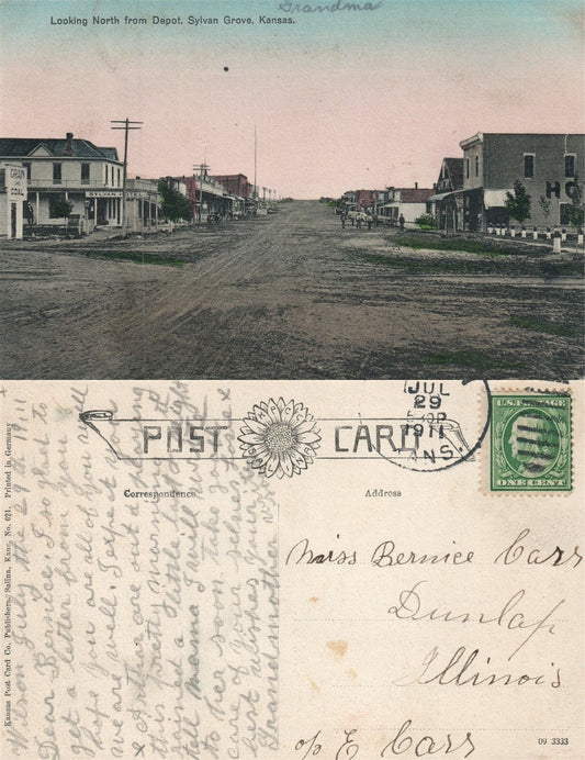 SYLVAN GROVE KS LOOKING NORTH FROM RAILROAD DEPOT ANTIQUE POSTCARD CORK CANCEL