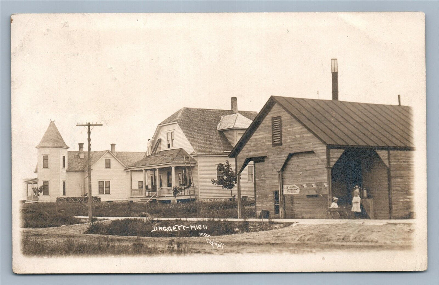 DAGGETT MI  MI STREET SCENE ROOF REPAIR ANTIQUE REAL PHOTO POSTCARD RPPC
