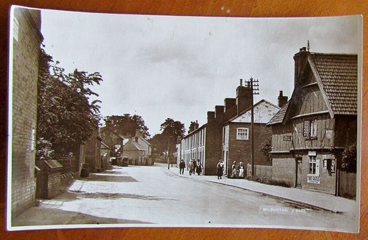 RPPC VINTAGE BRITISH PHOTO POSTCARD WILBURTON UK STREET SCENE