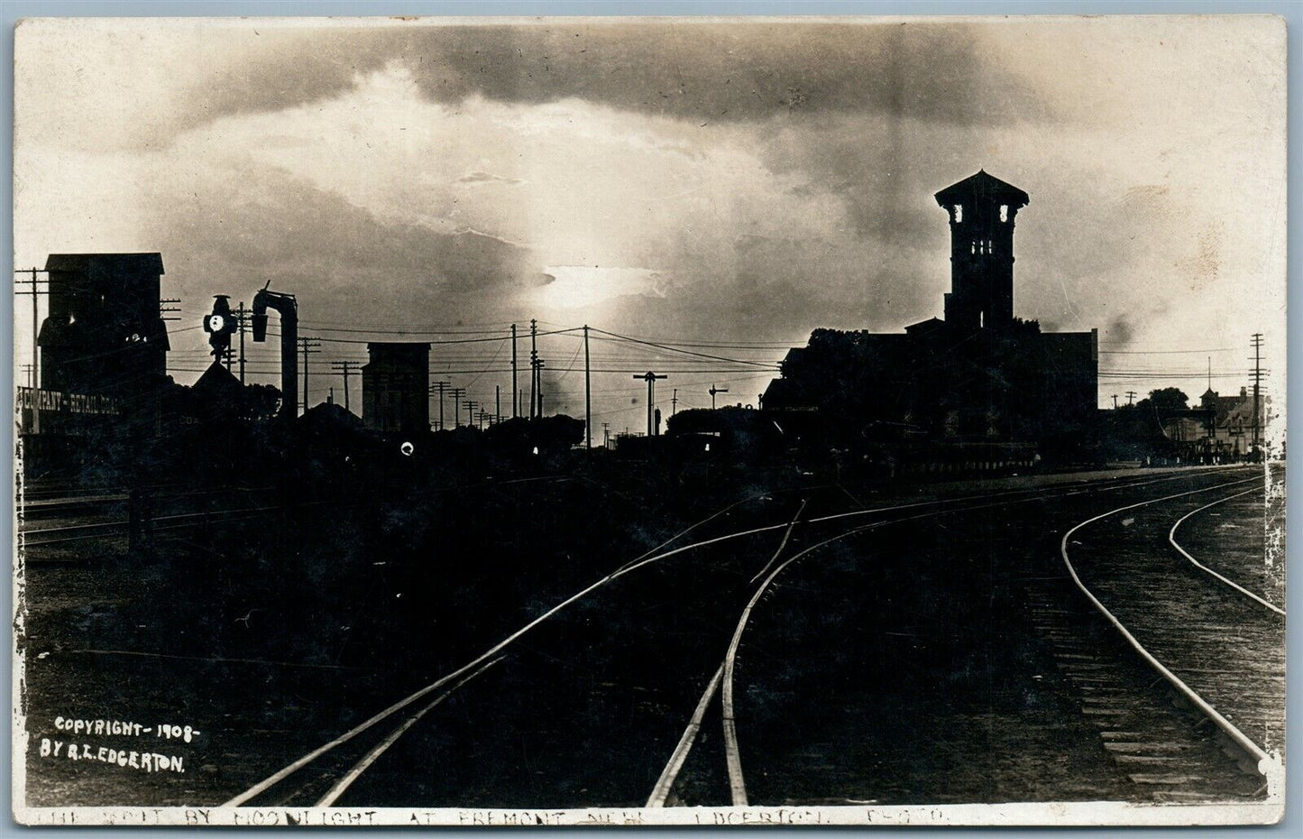FREMONT NE RAILROAD STATION AT NIGHT ANTIQUE REAL PHOTO POSTCARD RPPC railway