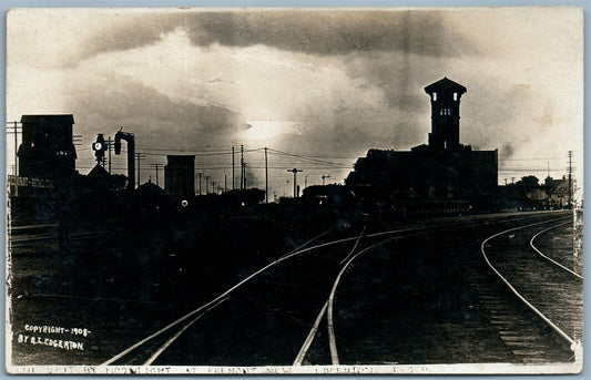 FREMONT NE RAILROAD STATION AT NIGHT ANTIQUE REAL PHOTO POSTCARD RPPC railway