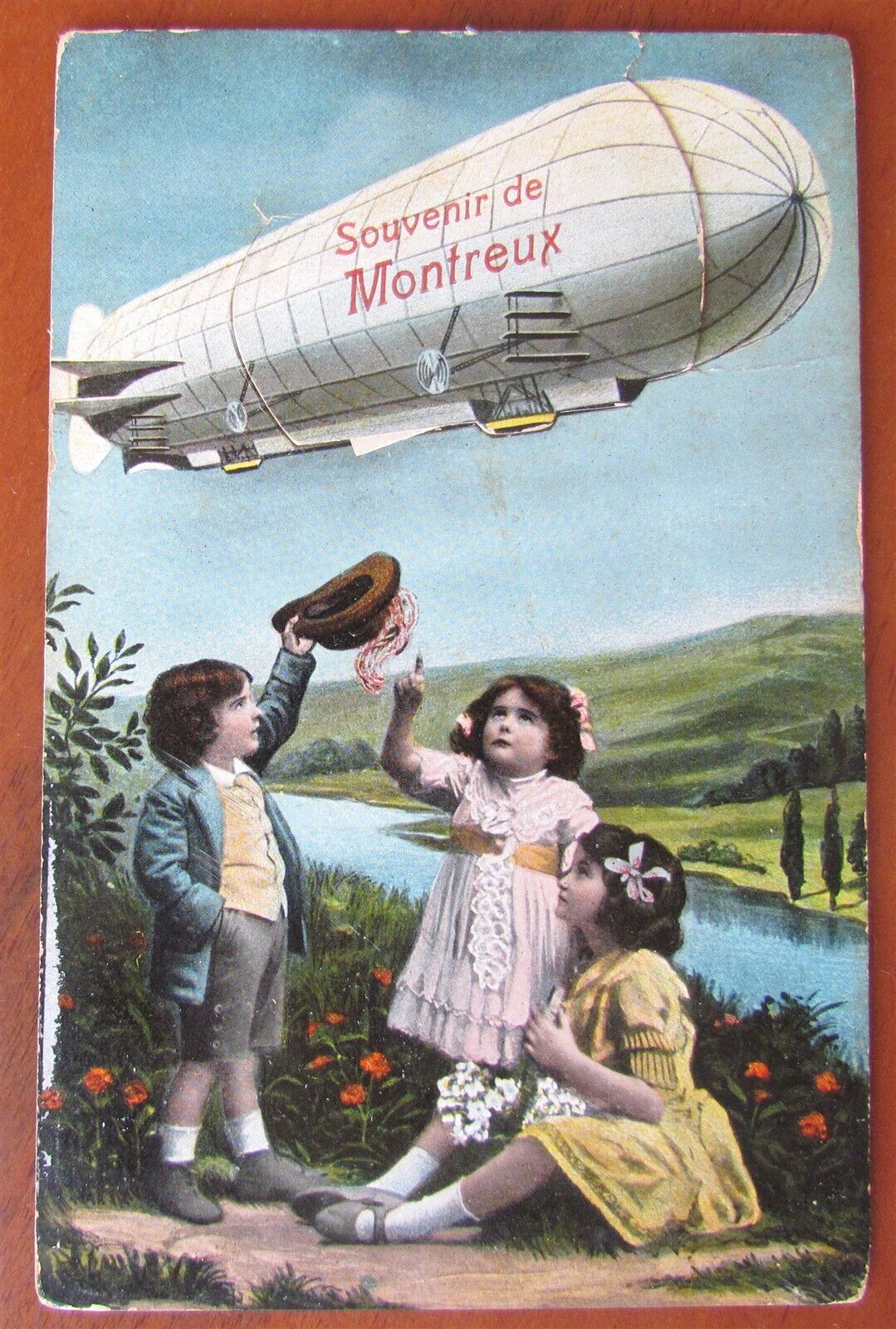 ZEPPELIN DIRIGIBLE ANTIQUE POSTCARD w/ FOLDED MINIATURE VIEWS of MONTREUX FRANCE