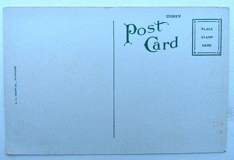 VINTAGE POSTCARD - MAIN STREET SCENE LOOKING WEST CHANUTE KANSAS