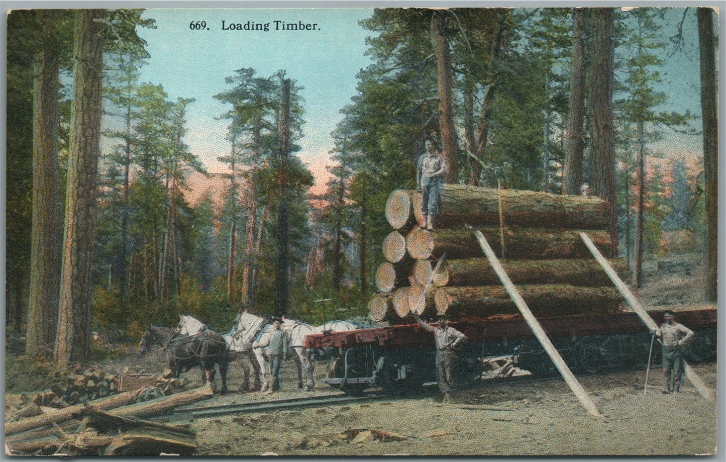 SPOKANE WA LOADING TIMBER ANTIQUE POSTCARD