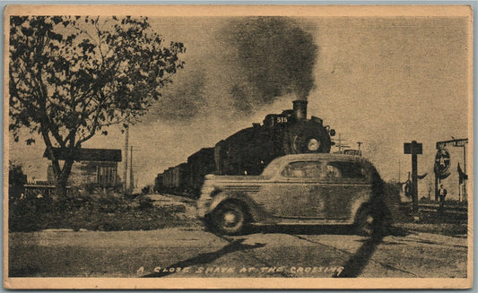 CLOSE SHAVE AT THE CROSSING VINTAGE POSTCARD w/ TRAIN RAILROAD & CAR