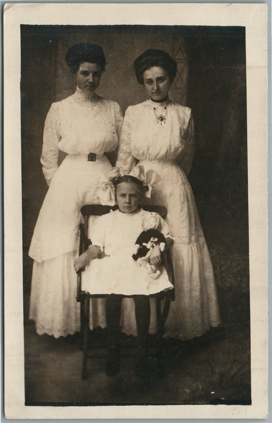 SERIOUS GIRL w/ DOLL ANTIQUE REAL PHOTO POSTCARD RPPC 3 women