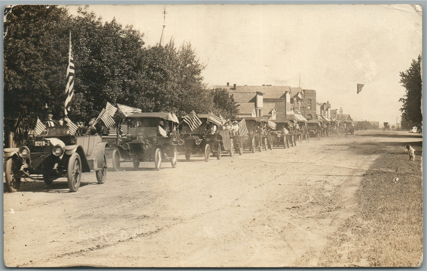 ELKTON SD PATRIOTIC PARADE OLD CARS US FLAGS ANTIQUE REAL PHOTO POSTCARD RPPC
