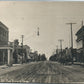 TWO RIVERS WI WASHINGTON STREET ANTIQUE REAL PHOTO POSTCARD ADVERTISING RPPC