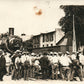 LOCOMOTIVE TRAIN ARRIVES AT RAILROAD STATION ANTIQUE REAL PHOTO POSTCARD RPPC