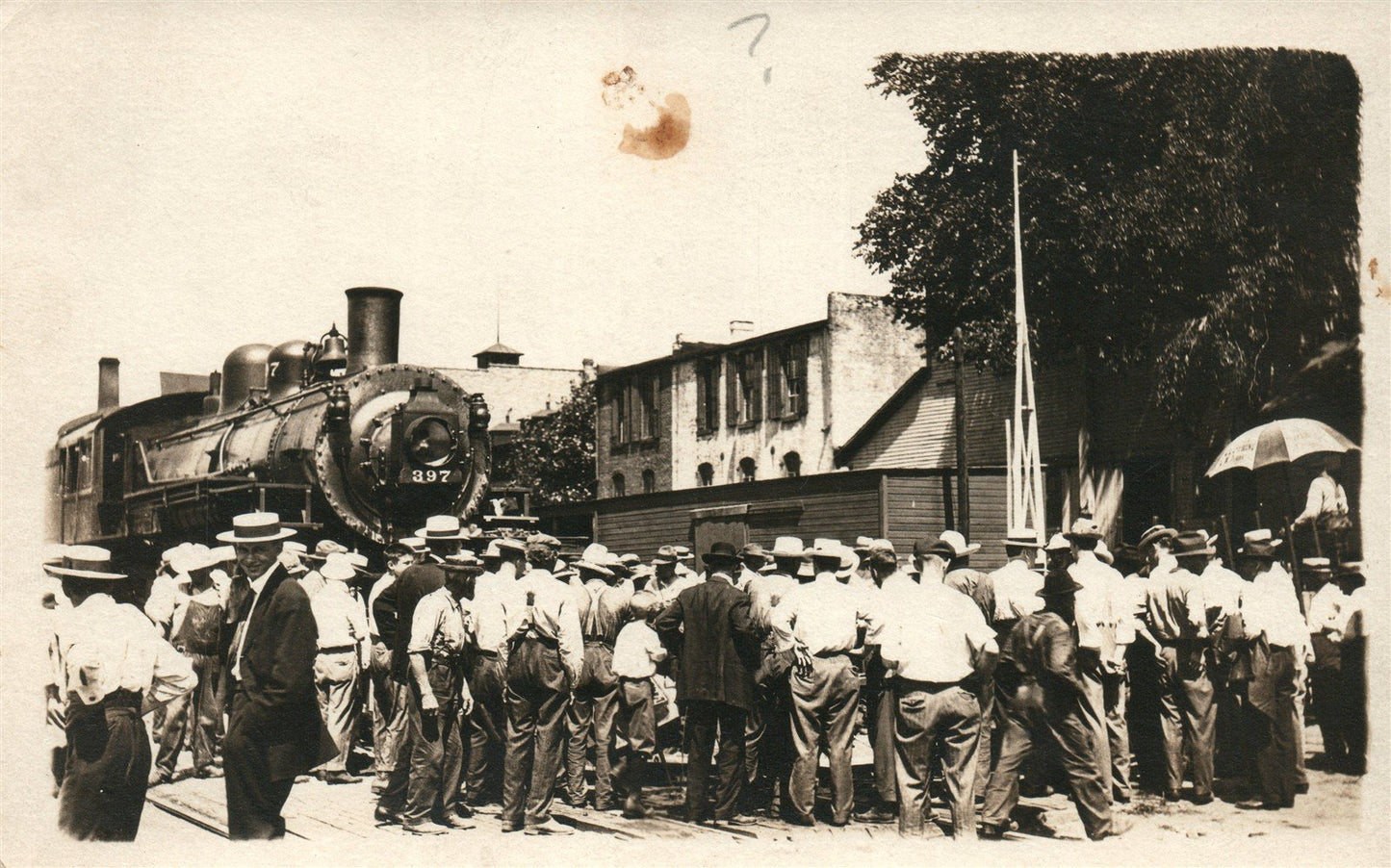 LOCOMOTIVE TRAIN ARRIVES AT RAILROAD STATION ANTIQUE REAL PHOTO POSTCARD RPPC