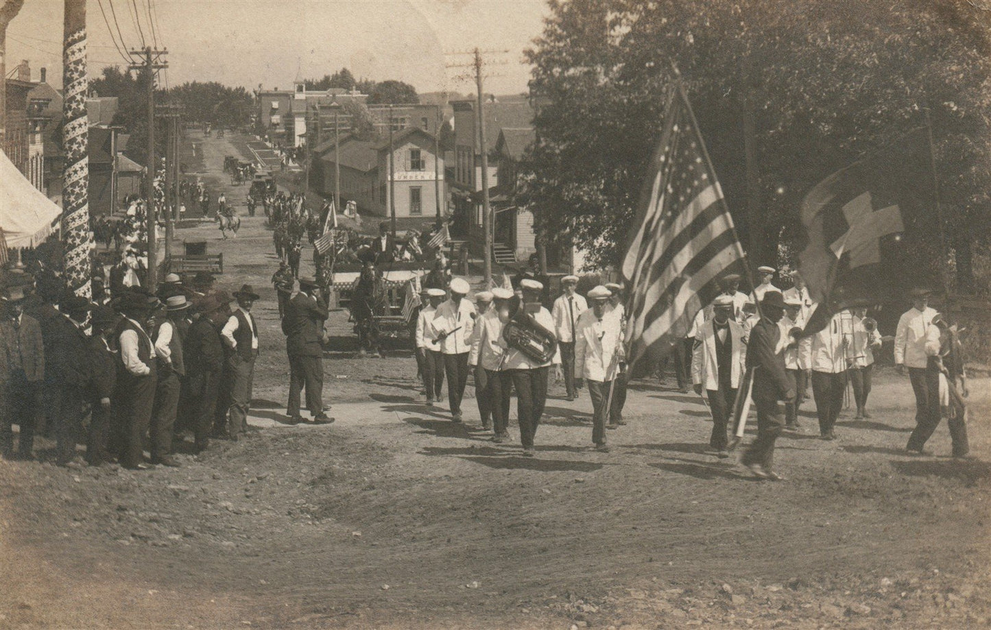 ALBANY WI PATRIOTIC PARADE w/ AMERICAN FLAG ANTIQUE REAL PHOTO POSTCARD RPPC