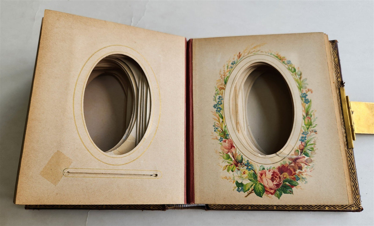 1870s PHOTO ALBUM w/ BRASS CLASP antique DECORATIVE LEAVES w/ FLOWER DESIGN
