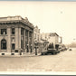 ELLENSBERG IN STREET SCENE w/ CARS VINTAGE REAL PHOTO POSTCARD RPPC