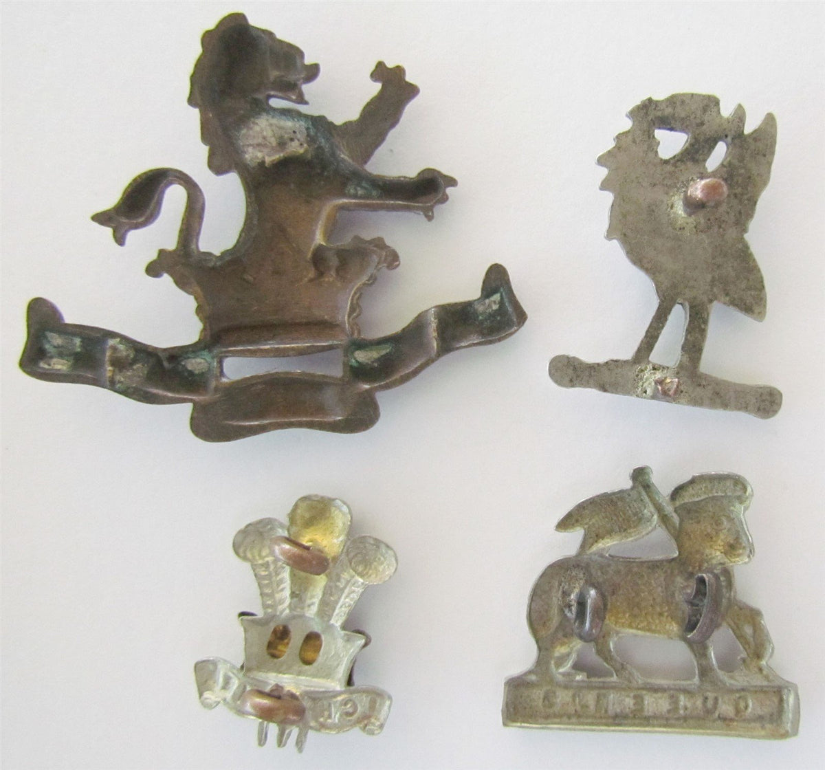 LOT OF 4 BRITISH VINTAGE CAP BADGES