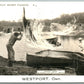 WESTPORT ONT. CANADA FISHING EXAGGERATED ANTIQUE REAL PHOTO PC RPPC CORK STAMP