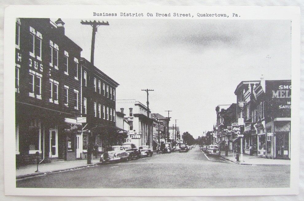 BUSINESS DISTRICT BROAD STREET QUAKERTOWN PA VINTAGE POSTCARD cars store signs