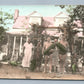 FARMERS FAMILY w/ HUGE CUCUMBERS ANTIQUE HAND COLORED REAL PHOTO POSTCARD RPPC