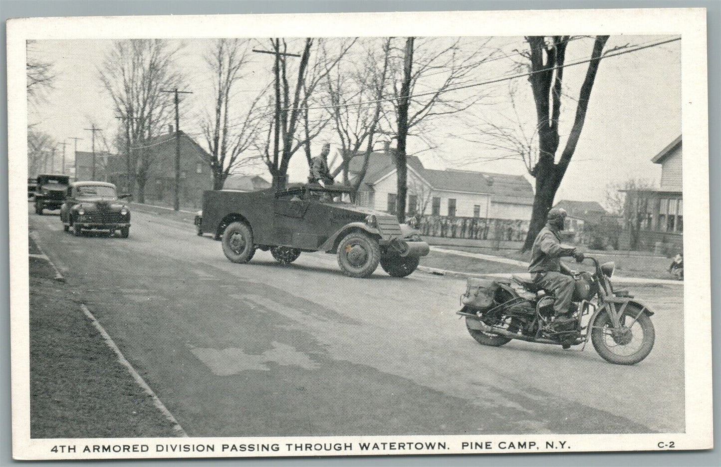 PINE CAMP NY MOTORCYCLE & ARMORED DIVISION PASSING WATERTOWN VINTAGE POSTCARD