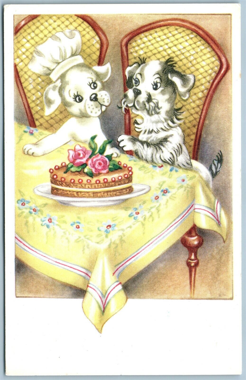 DOGS EATING CAKE VINTAGE POSTCARD