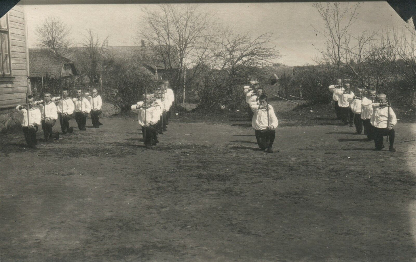 BOYS MILITARY EXERCISES ANTIQUE REAL PHOTO POSTCARD RPPC