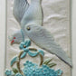 MECHANICAL ANTIQUE POSTCARD w/ ATTACHED CELLULOID DOVE with FLOWER BASKET