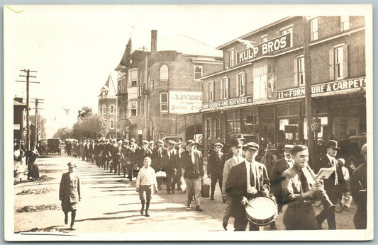 STREET PARADE ANTIQUE REAL PHOTO POSTCARD RPPC KULP BROS SIGN