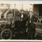WELL DRESSED COUPLE w/ VINTAGE CAR ANTIQUE REAL PHOTO POSTCARD RPPC