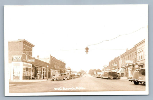 WEST BRANCH MI VINTAGE REAL PHOTO POSTCARD RPPC STREET VIEW COCA COLA SIGN