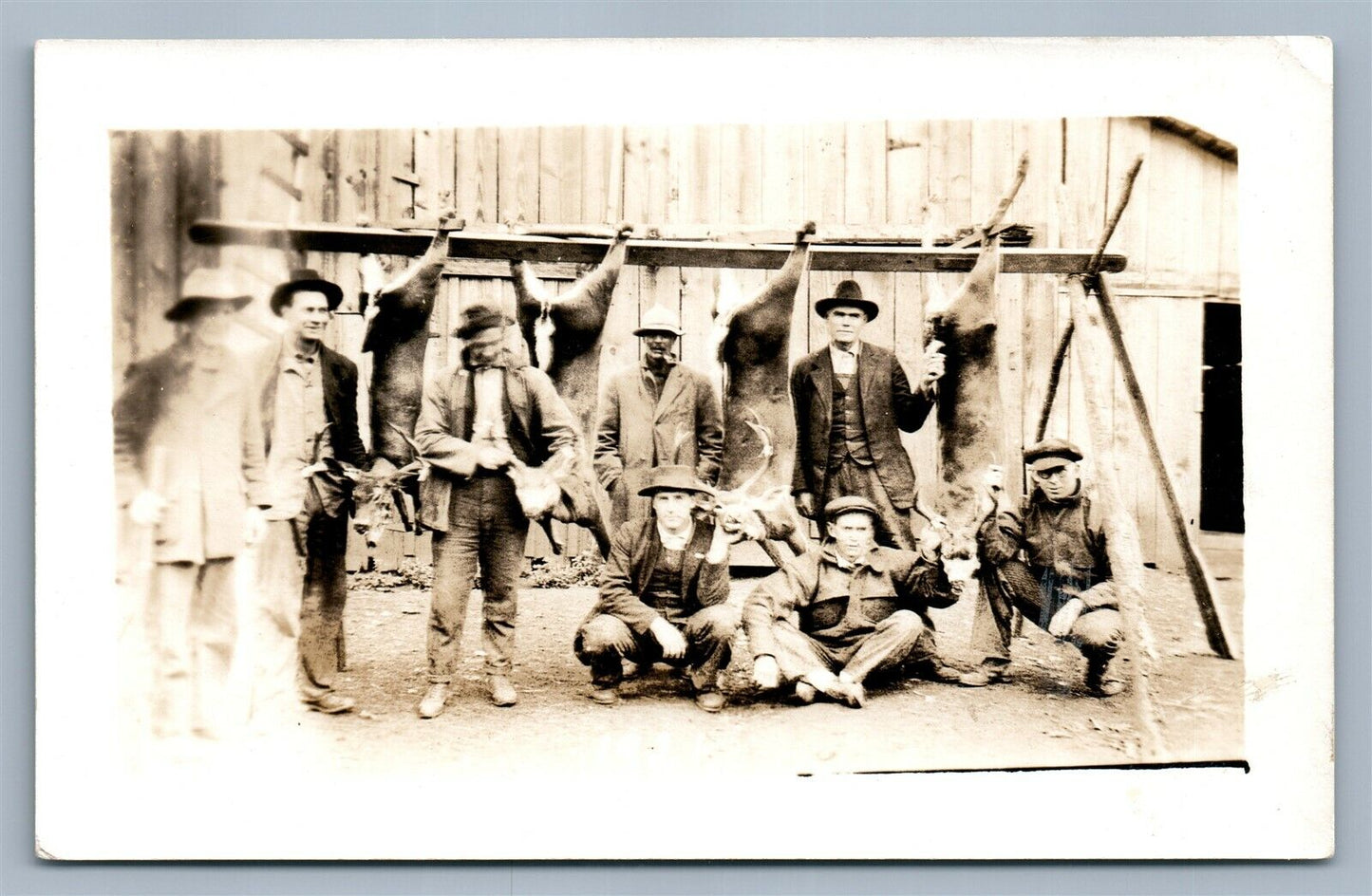 GROUP of HUNTERS ANTIQUE REAL PHOTO POSTCARD RPPC