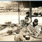 AMERICAN INDIAN FAMILY PREPARING FISH VINTAGE REAL PHOTO POSTCARD RPPC