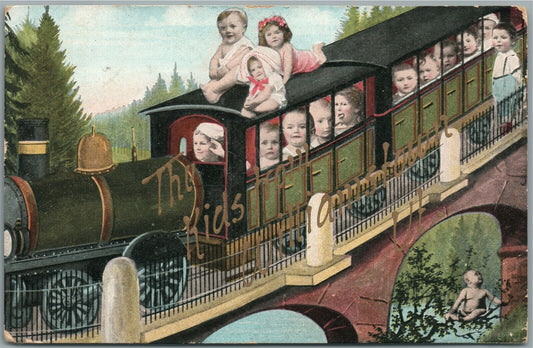 MULTI BABIES KIDS TRAIN ANTIQUE POSTCARD