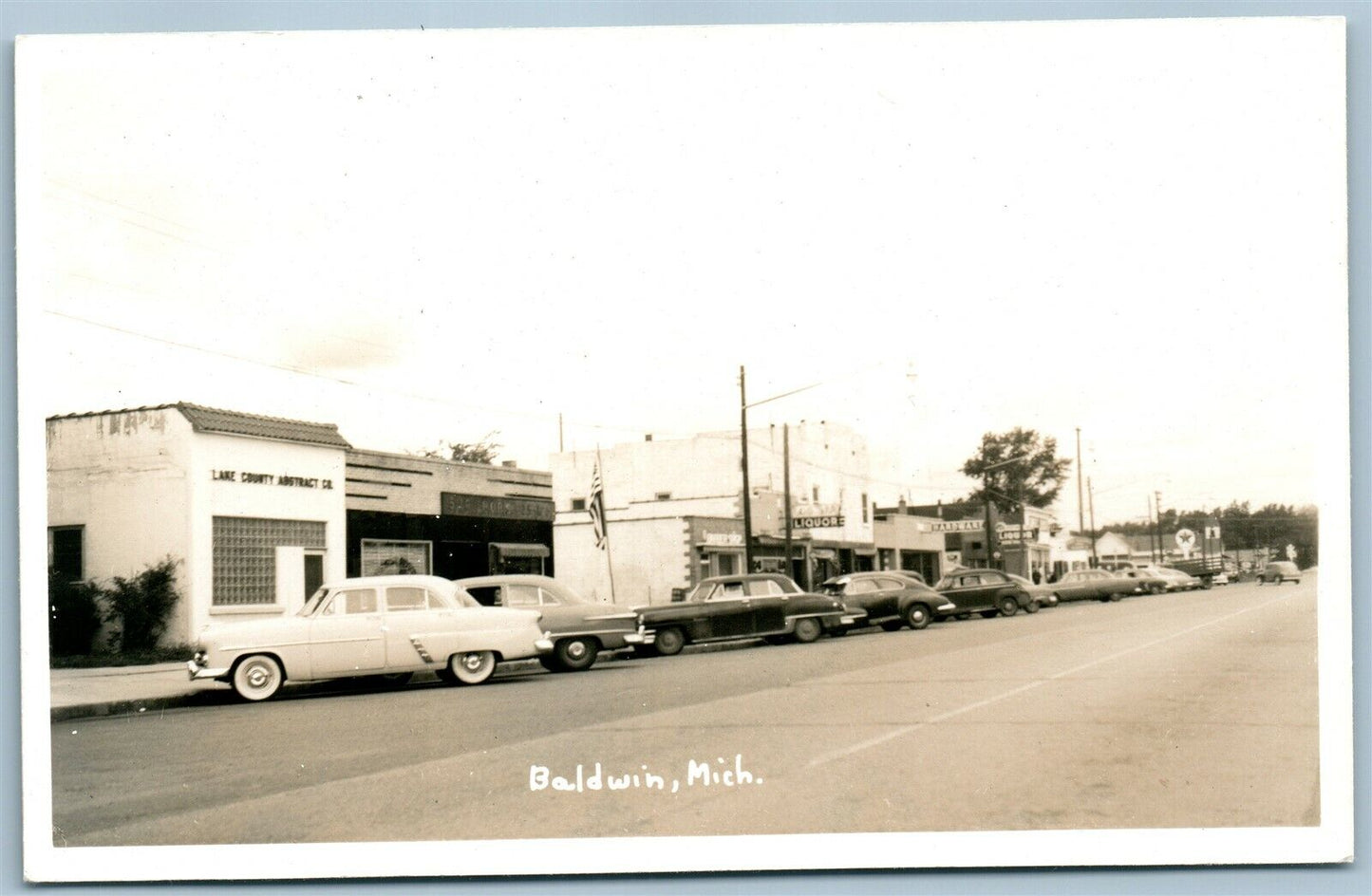 BALDWIN MI STREET SCENE VINTAGE REAL PHOTO POSTCARD RPPC