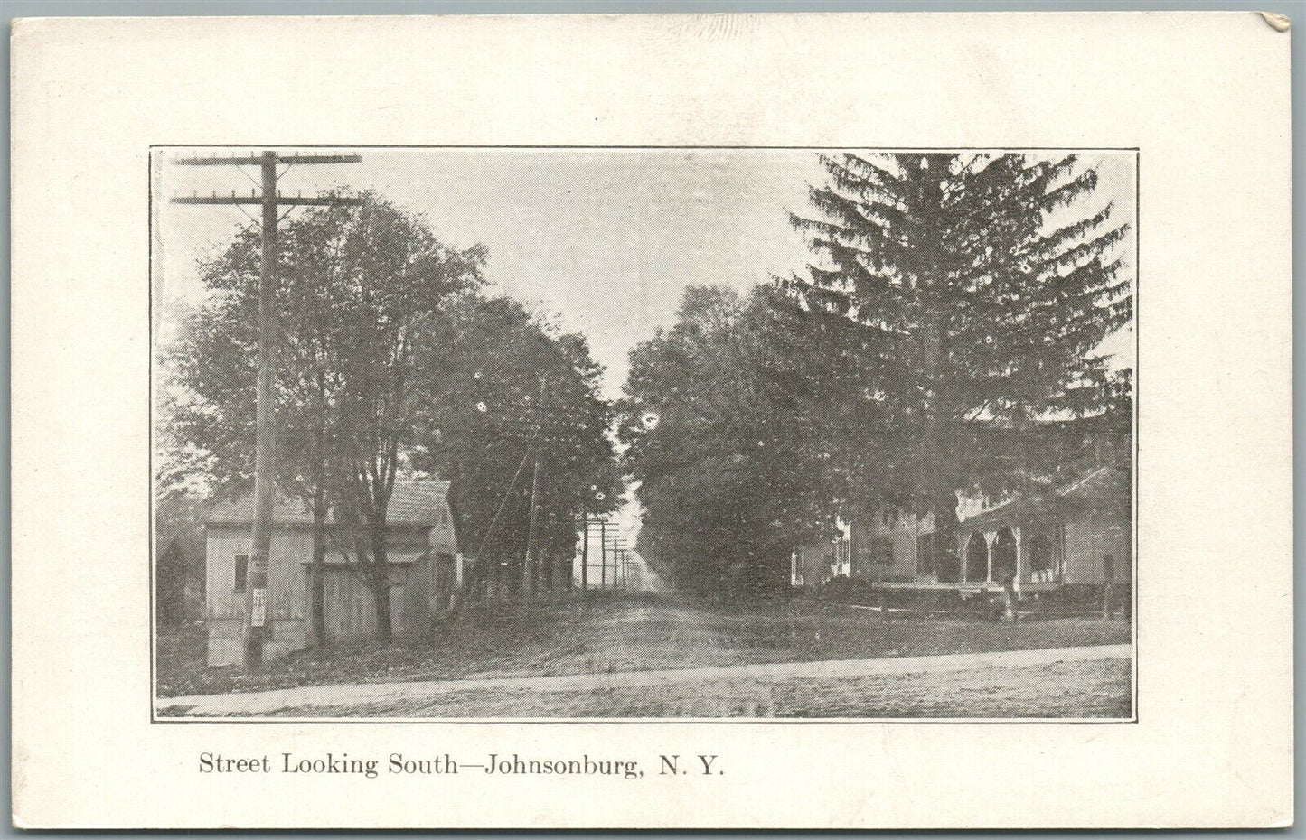 JOHNSONBURG NY STREET LOOKING SOUTH ANTIQUE POSTCARD