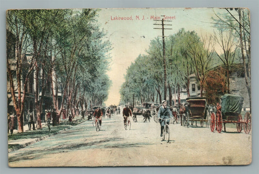LAKEWOOD NJ MAIN STREET BIKE RIDERS ANTIQUE POSTCARD