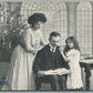 HAPPY FAMILY w/ CHRISTMAS TREE NEW YEAR ANTIQUE POSTCARD