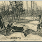 WAUPON WI HUNTING RABBIT EXAGGERATED 1911 ANTIQUE POSTCARD