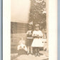 GIRLS w/ LARGE DOLL & PUPPY ANTIQUE REAL PHOTO POSTCARD RPPC