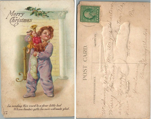 MERRY CHRISTMAS GREETINGS EMBOSSED ANTIQUE POSTCARD - SMALL BOY w/ TOYS