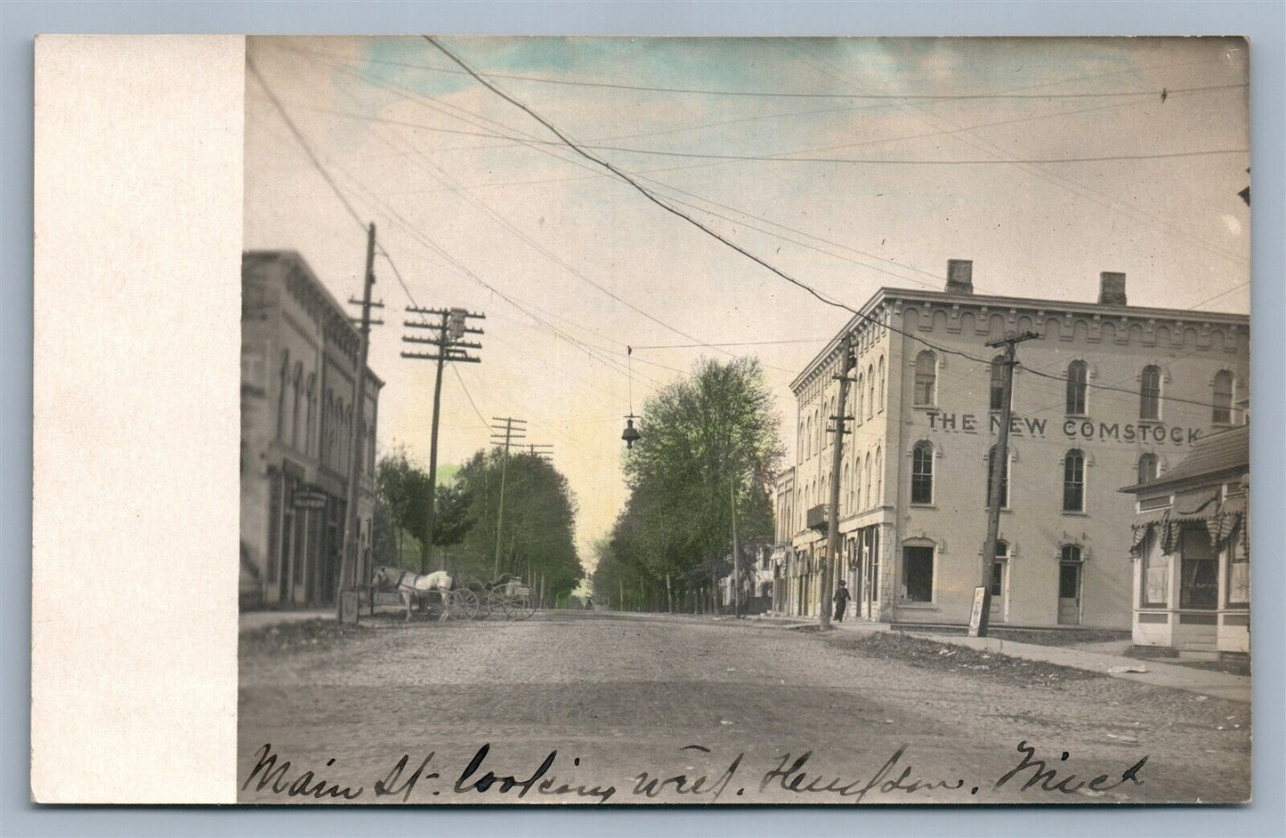 MICHIGAN TOWN MAIN STREET HAND COLORED ANTIQUE REAL PHOTO POSTCARD RPPC