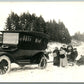 AUTOMOBILE PULLING THE SLEDS in SNOW ANTIQUE REAL PHOTO POSTCARD RPPC